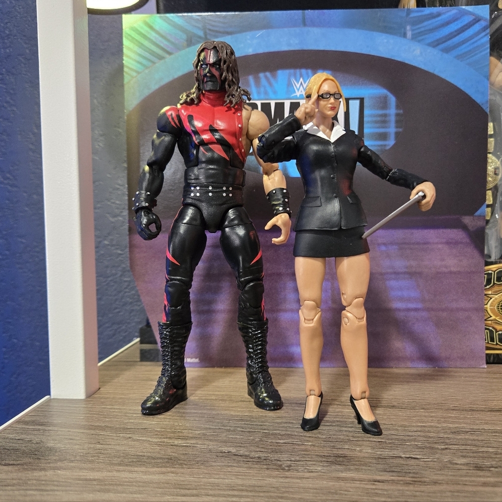 WWE Kane And Stacy Keibler Action Figures.